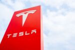 INV TeslaSign GettyImages 2148753423 1a4a454f8e5147d9a8b7e1bfbf16adf7