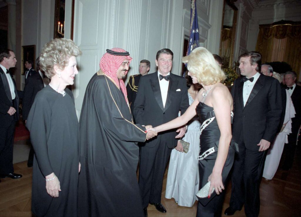 Ivana Trump shakes hands with Fahd of Saudi Arabia 4fe8ea9bb8934fb69affd24a8534598a