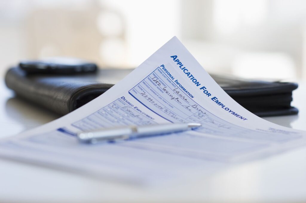 application for employment and pen 103922773 5b69f457c9e77c0050bfaa26