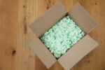 cardboard box with packing peanuts 502220129 be4430149a6d477cabebd0c3f93486c1
