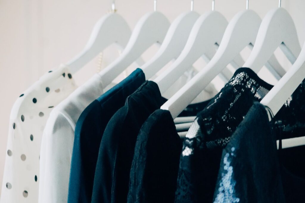 close up of clothes hanging at store 1134693581 9932b86372cf4b46b6cac6ef827a1e0f