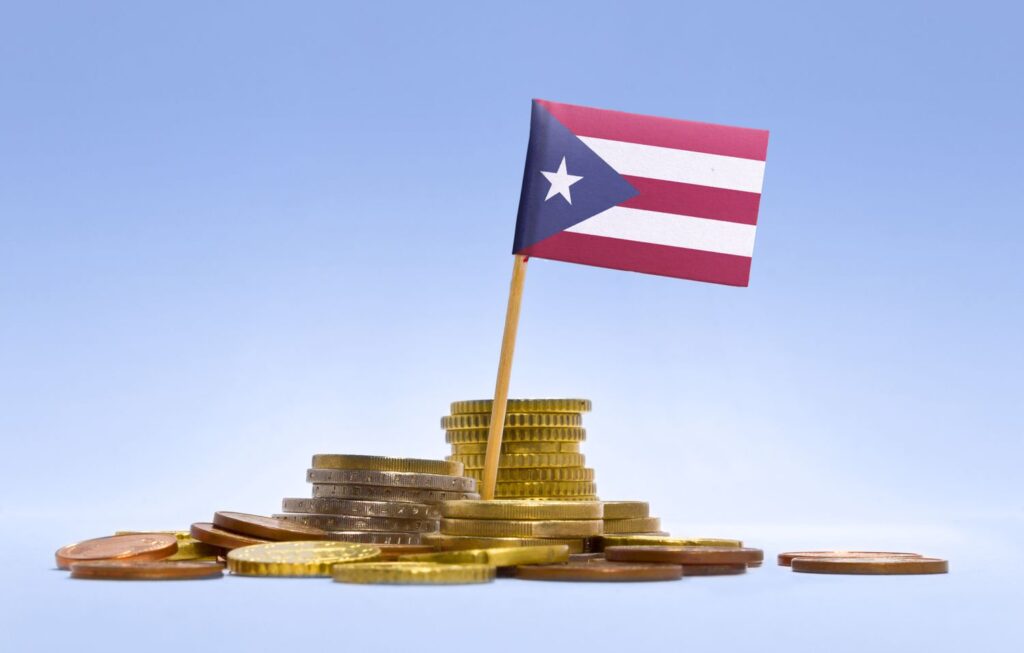 flag of puerto rico in a stack of coins series 466549140 540e02d2abcd4ef7ae0dbac4a15faddf