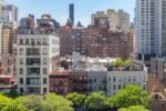 new york city overhead view of historic buildings along 59th street with the midtown manhattan sky