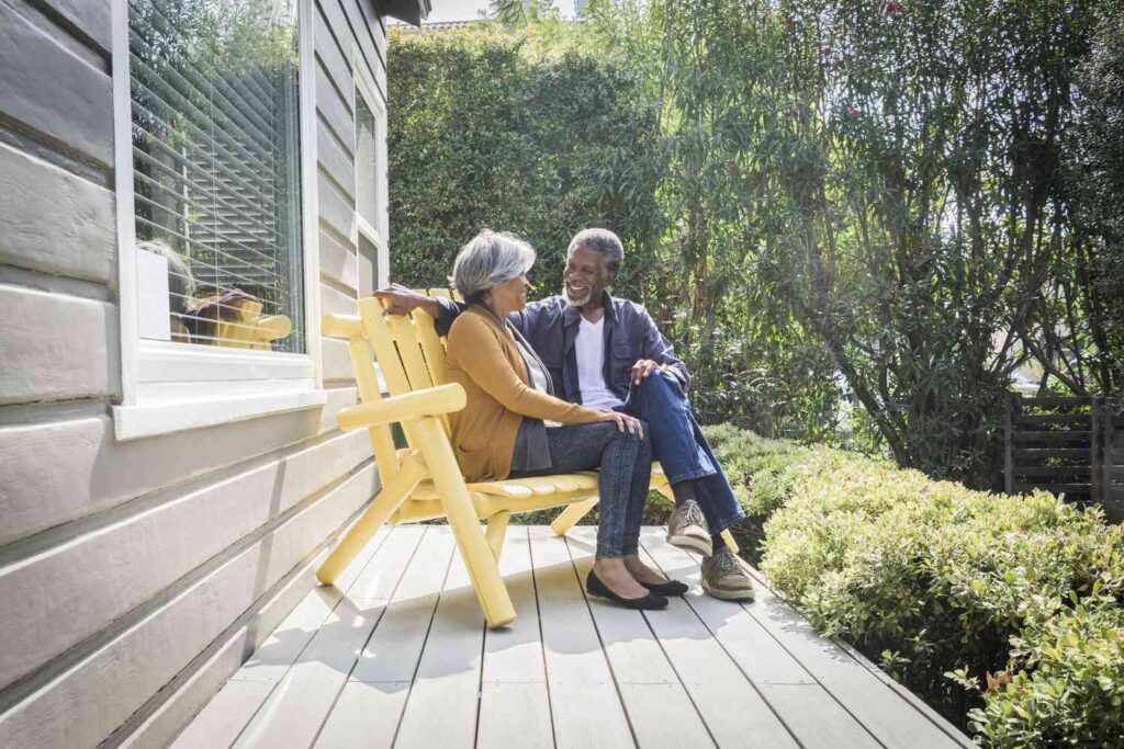 senior african american couple sitting on porch outside house 623699434 588b91685f9b5874ee5726fa 89c