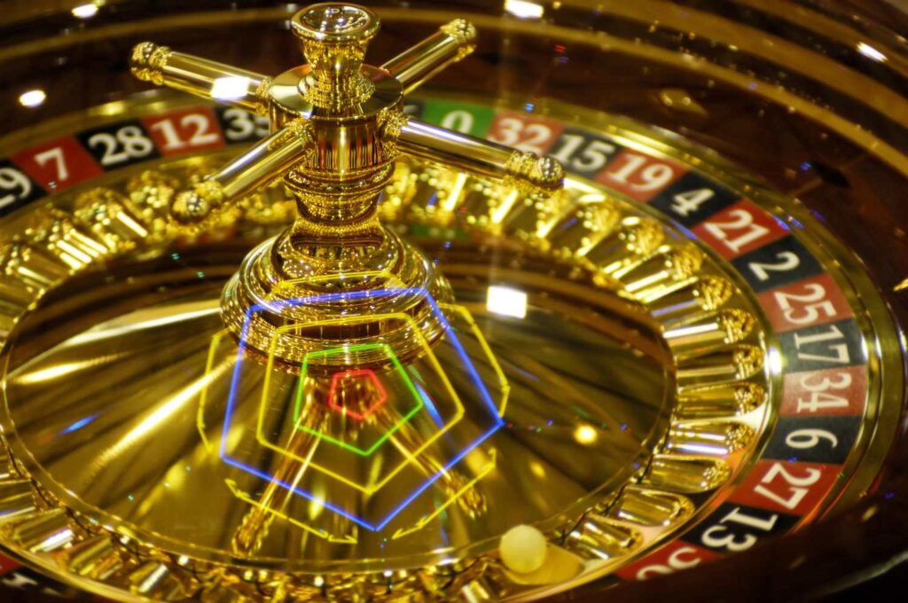 shining spinning golden casino roulette gambling and casino equipment conceptual background 17780848