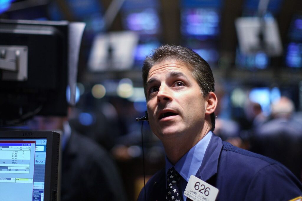 stock trader watching 56a9a7933df78cf772a94129