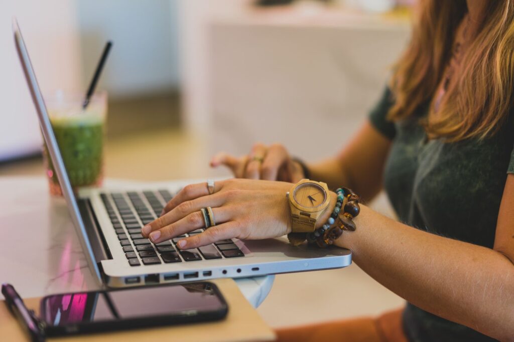 technology hands woman laptop phone keyboard work typing coffee shop person using laptop t20 dolo1n