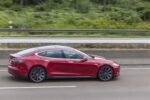 tesla model s on the highway 582261244 321e650b689544d8bde7d60c20a9ce5d