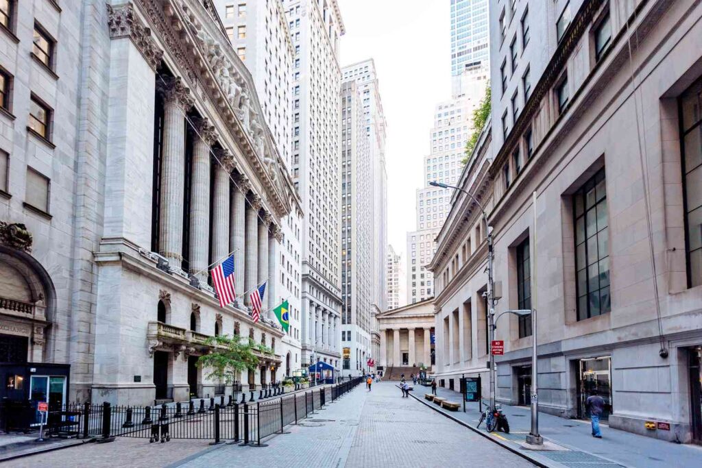 wall street and new york stock exchange in downtown manhattan new york city usa 1167037043 1e16292