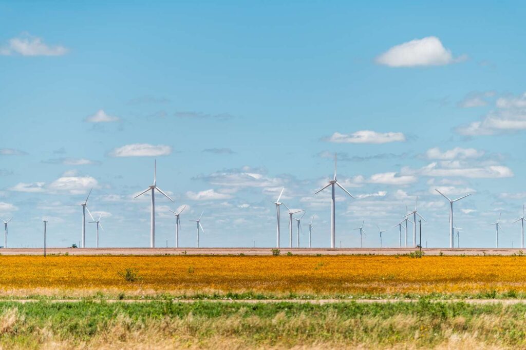 wind turbine farm generator near roscoe or sweetwater texas in usa in prairie with rows of many mach
